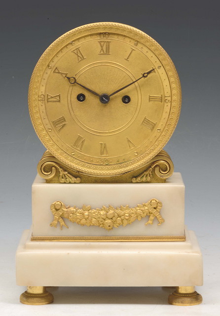 Appraisal: A REGENCY ORMOLU DRUM HEAD MANTEL CLOCK having a matt