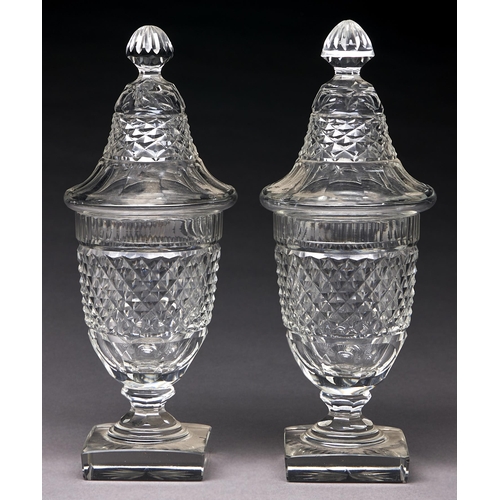 Appraisal: A pair of shield shaped cut glass sweetmeat vases and