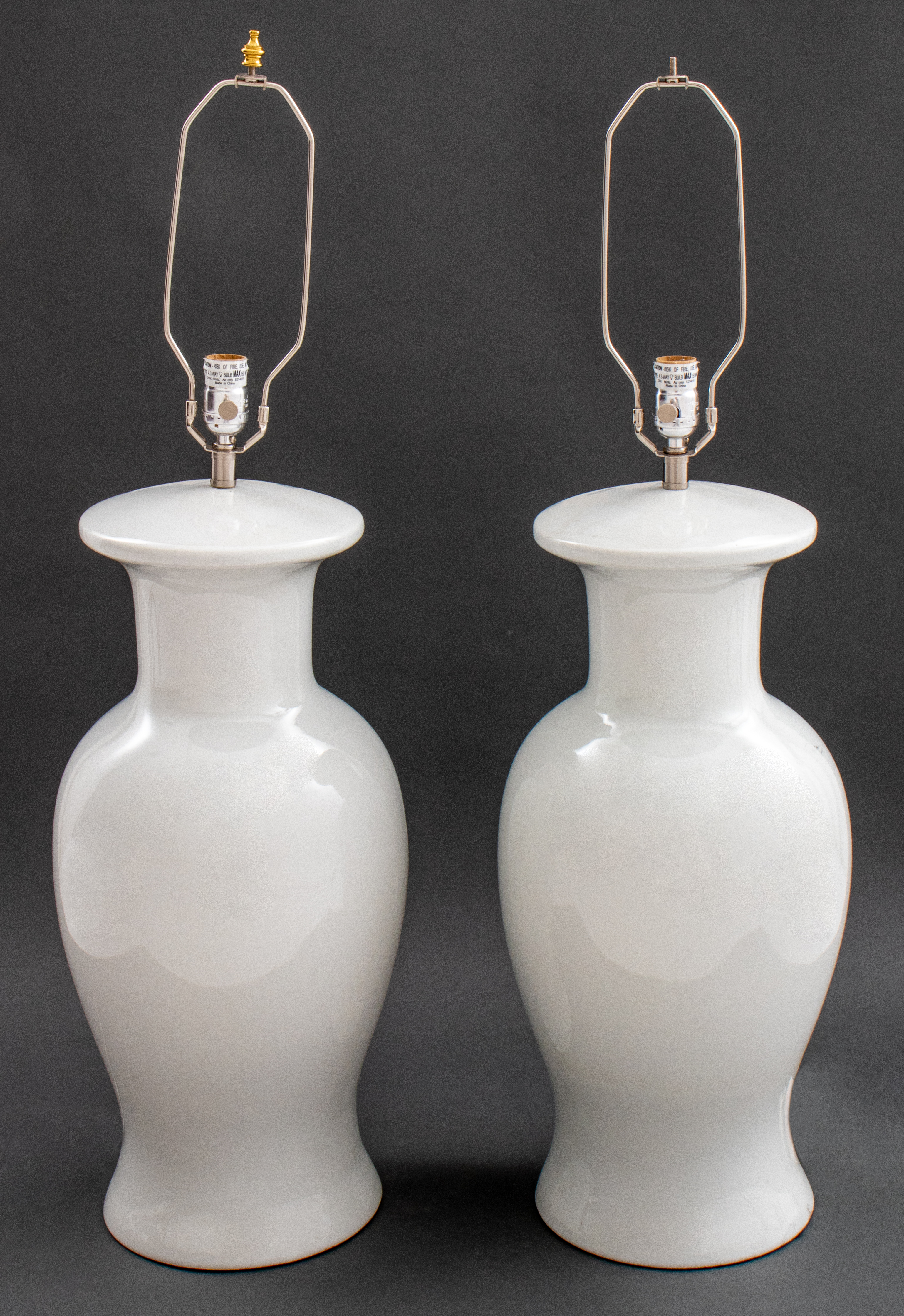 Appraisal: MASSIVE BLANC DE CHINE CERAMIC BALUSTER LAMPS PR Pair of