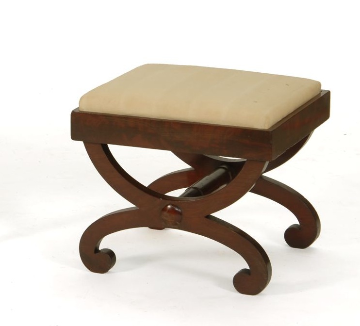 Appraisal: CLASSICAL UPHOLSTERED CURULE-FORM FOOTSTOOL Massachusetts Circa - In mahogany and