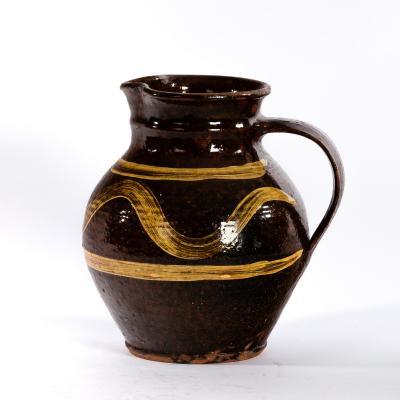 Appraisal: Michael Cardew Winchcombe Pottery a slipware pottery jug brown glaze