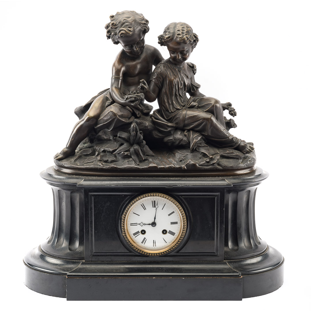 Appraisal: French bronze and marble mantel clock black marble columnar base