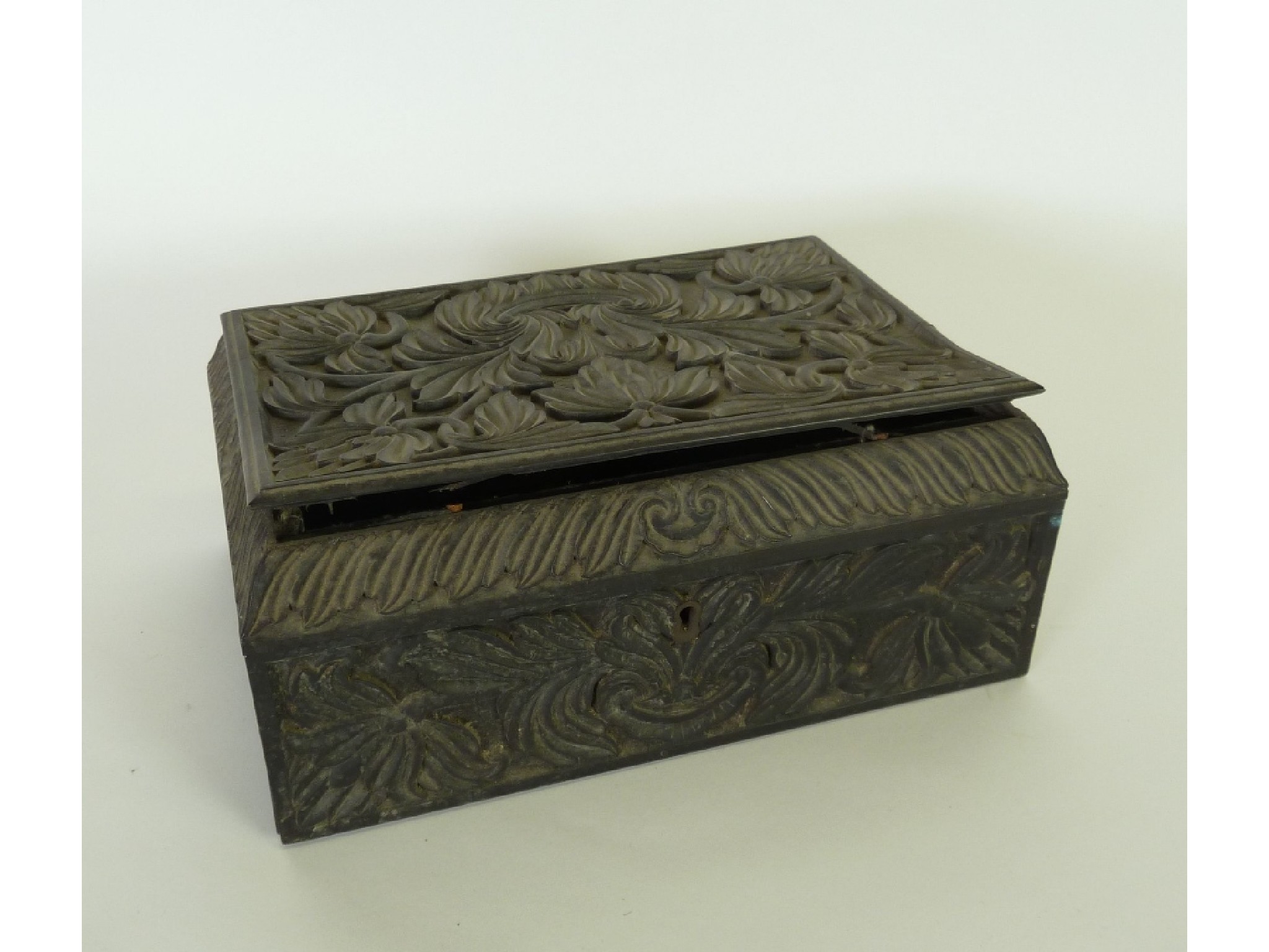 Appraisal: AN INDIAN FOLIATE SCROLL CARVED EBONY WORK BOX engraved on