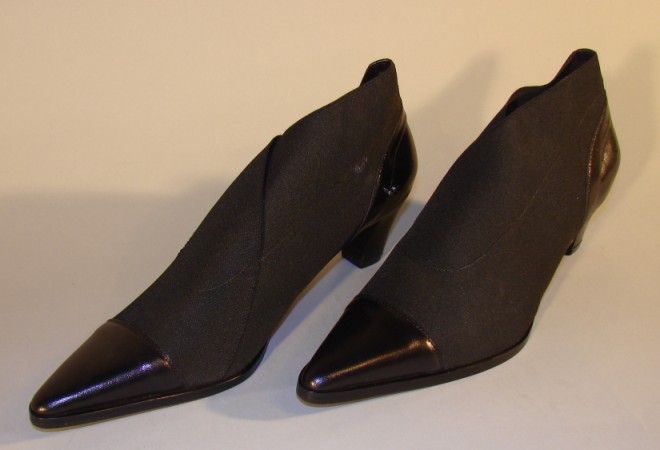 Appraisal: Black shoe boots were never worn Made of stretchy fabric