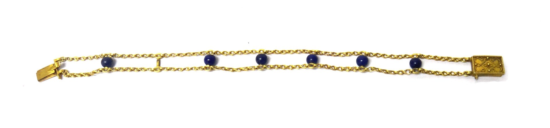 Appraisal: A Victorian gold and lapis lazuli bead bracelet in a