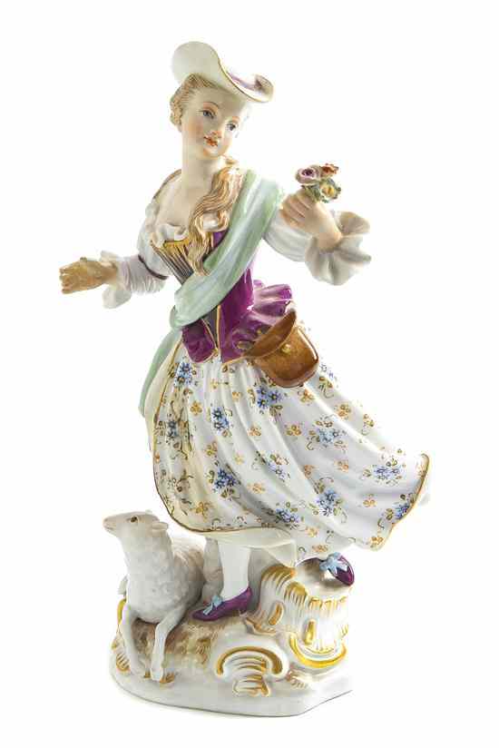 Appraisal: A Meissen Porcelain Figural Group depicting a shepherdess with a