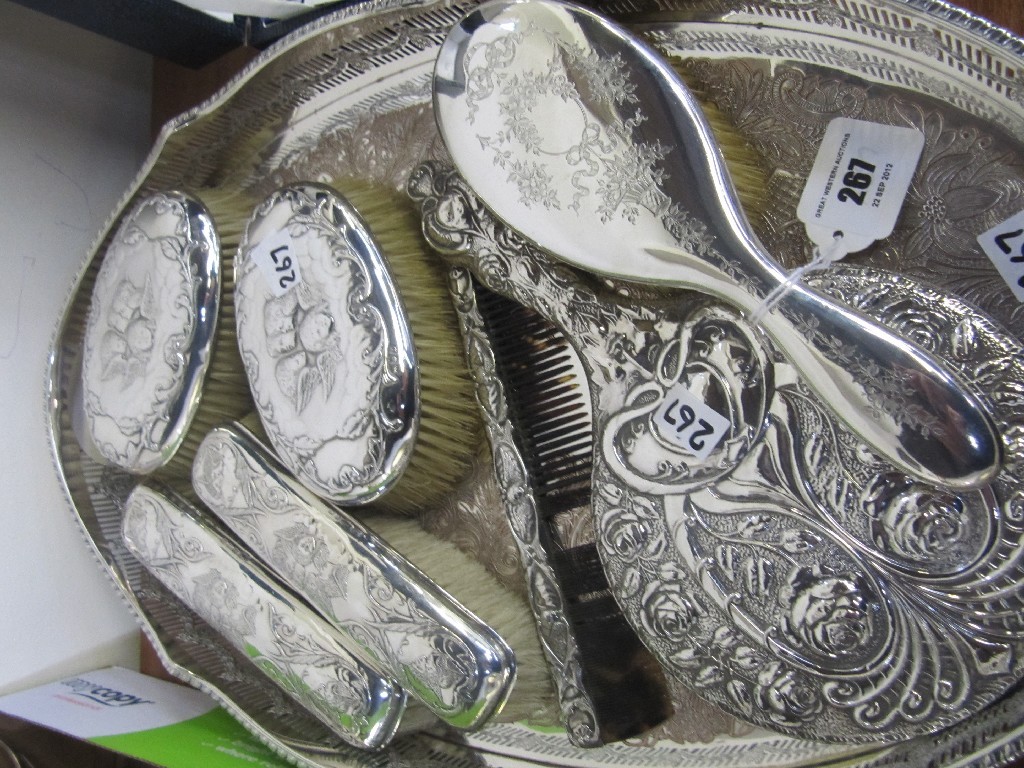 Appraisal: A lot comprising a set of four silver backed brushes