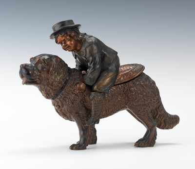 Appraisal: A Large Figural Tobacco Humidor Boy and Dog Large terracotta