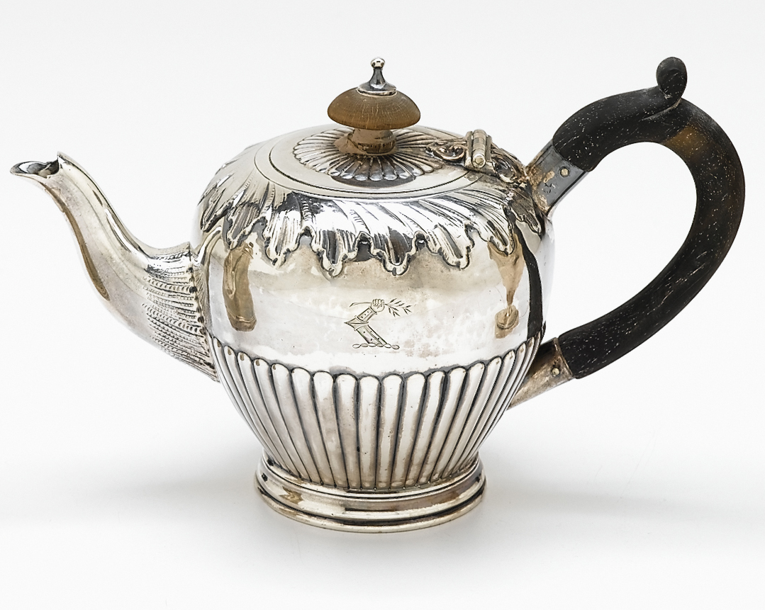 Appraisal: George III sterling silver small teapot london marks rubbed decorated