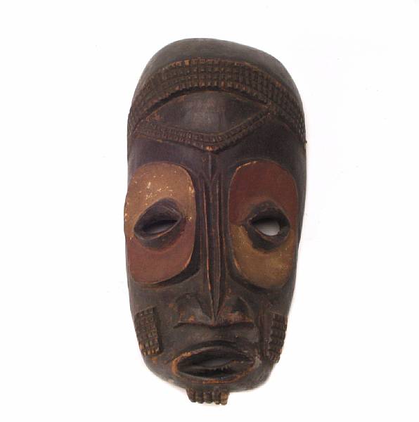 Appraisal: Two ethnographic masks one of palm possibly indonesian the second