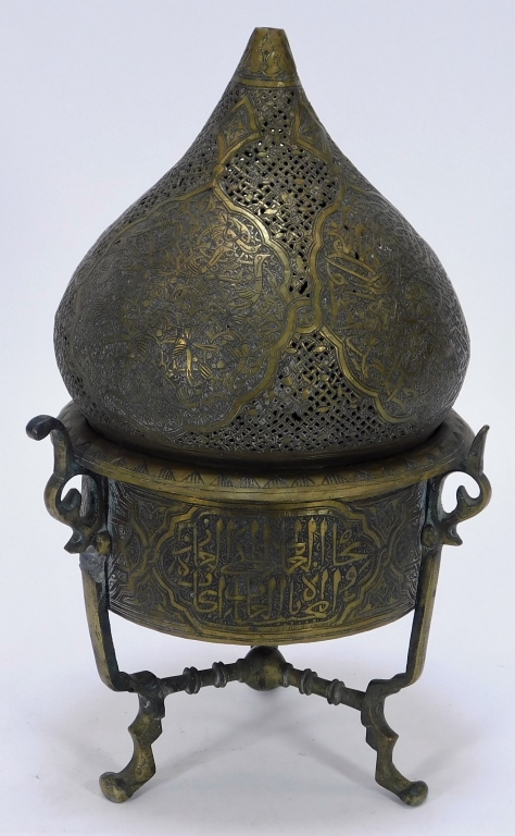 Appraisal: INDO-PERSIAN TRI FOOTED BRONZE CENSER India Early th CenturyPeach shaped