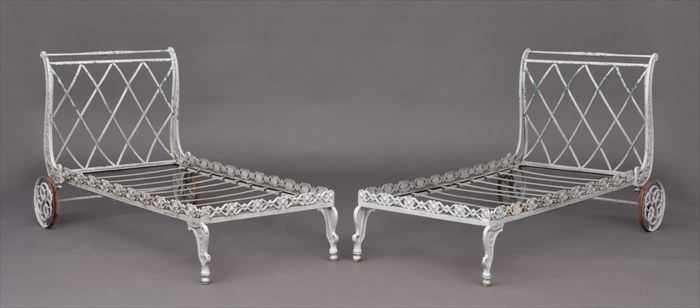 Appraisal: PAIR OF VICTORIAN-STYLE WHITE-PAINTED CAST-IRON GARDEN CHAISES LONGUES Each with