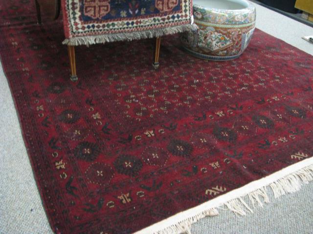 Appraisal: A semi-antique Afghani Uzbek Turkoman area rug ' x '