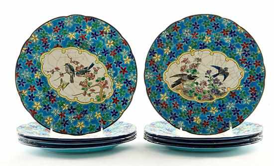 Appraisal: Longwy pottery set of plates circa enameled faience field centering