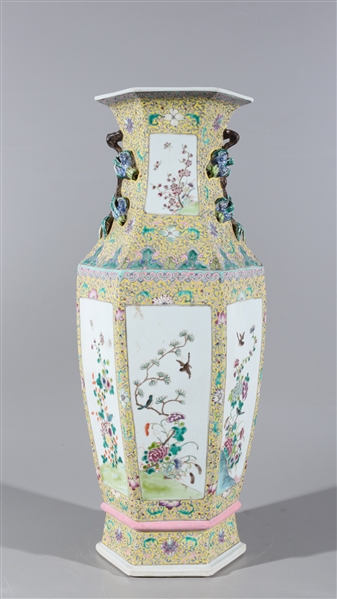 Appraisal: Chinese famille rose enameled porcelain faceted vase with flowers and