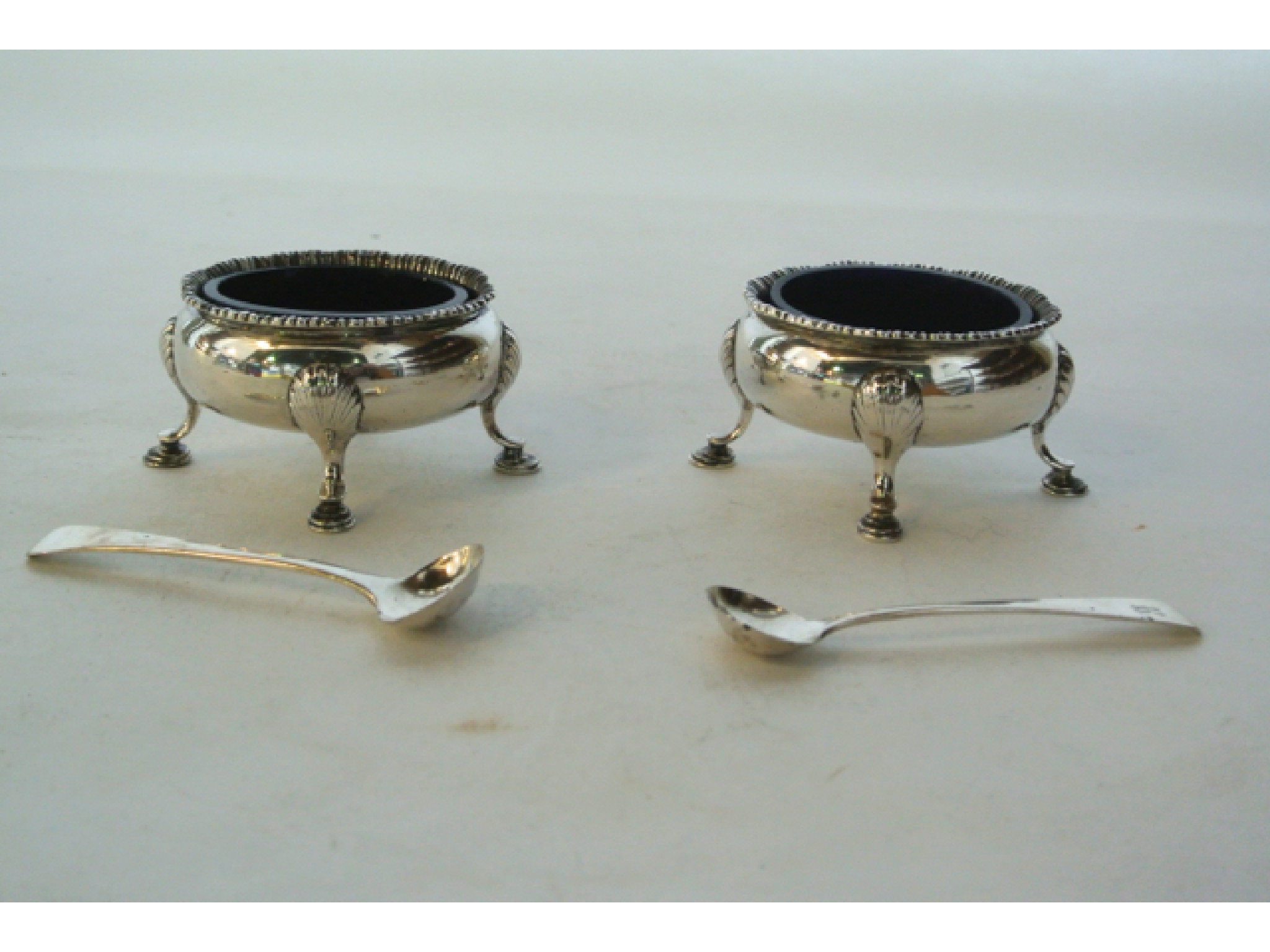 Appraisal: A pair of George V silver salt cellars possibly Thomas