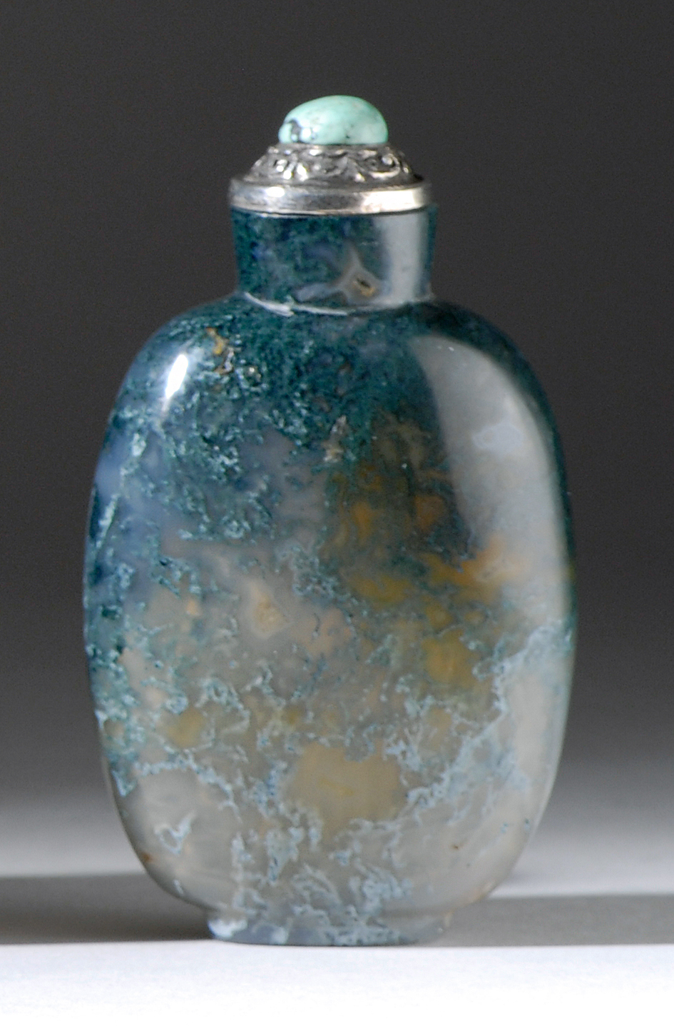 Appraisal: CHALCEDONY AGATE SNUFF BOTTLE Mid- th CenturyIn elongated ovoid form