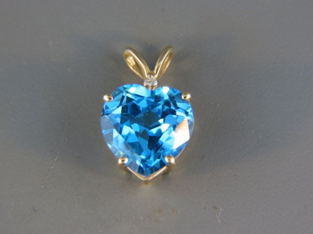 Appraisal: Blue Topaz Pendant rich London blue heart shape gem weighing