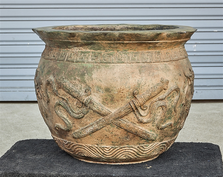 Appraisal: Chinese bronze jardiniere relief design of crossed swords and foliage