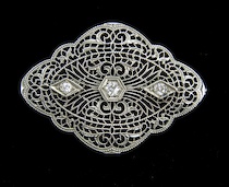 Appraisal: A Vintage White Gold Filagree Brooch With Three Diamonds A