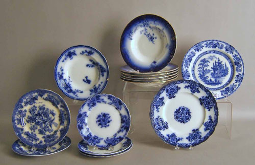 Appraisal: Fourteen flow blue plates and soup bowls