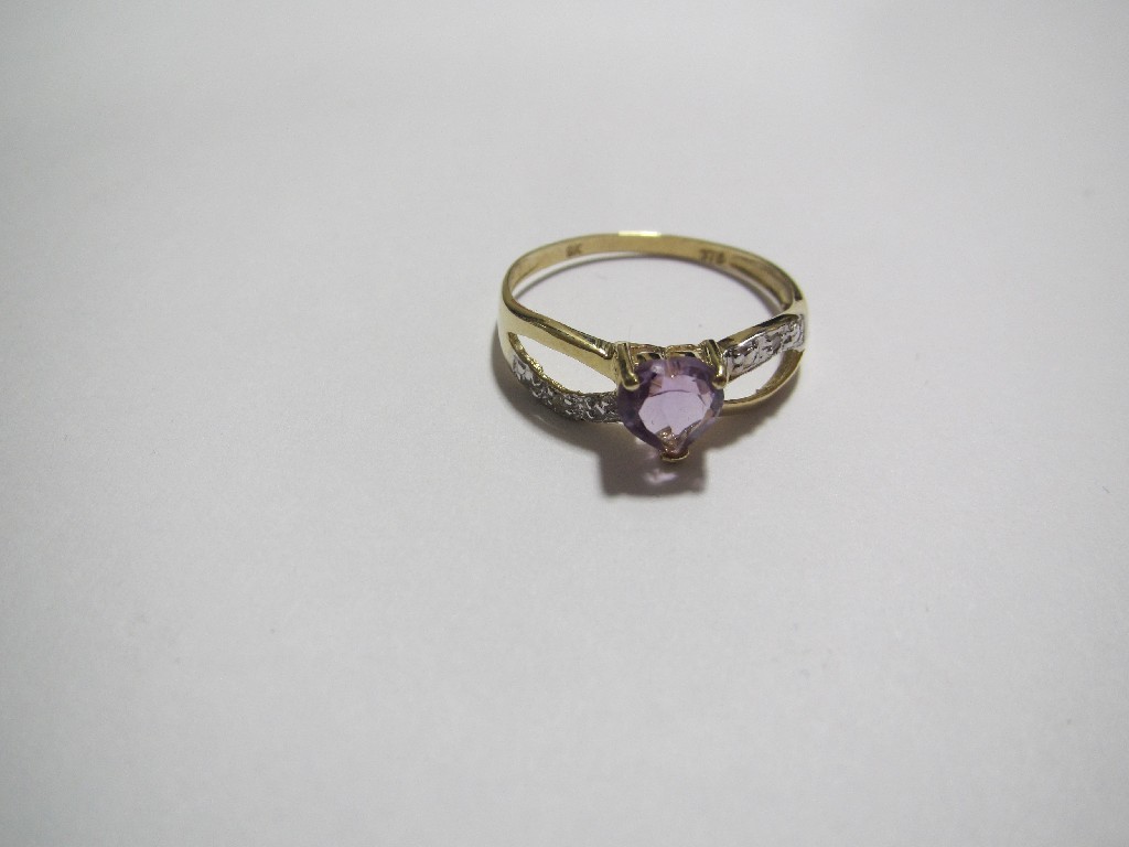 Appraisal: A heart shaped amethyst and diamond ring set in yellow