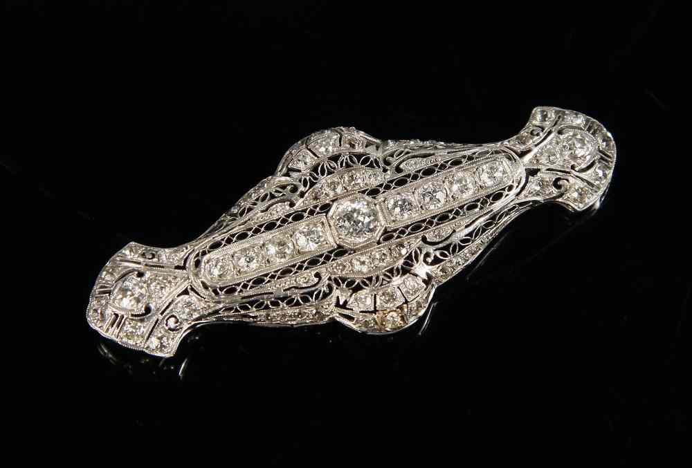 Appraisal: BROOCH - Platinum and diamond filigree pendant brooch ca Hand