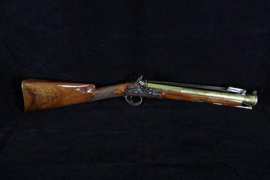 Appraisal: An th Century flintlock blunderbuss by Peacock London the walnut