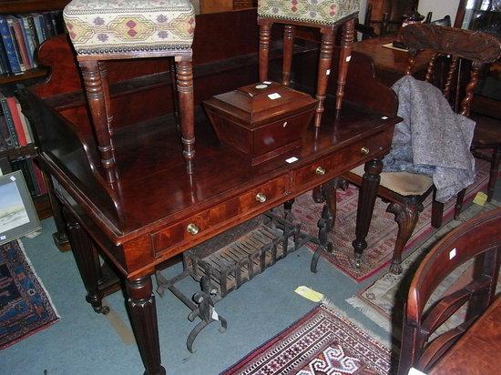 Appraisal: A TH CENTURY MAHOGANY WRITING TABLE in the manner of