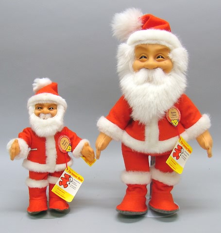 Appraisal: Pair of MINT Replica Santa Claus PVC heads and felt