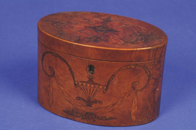 Appraisal: A GEORGE III MARQUETRY AND VENEERED OVAL TEA CADDY the