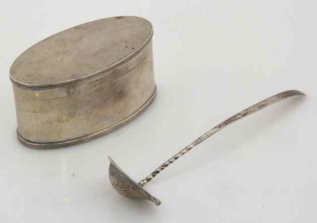 Appraisal: An oval silver box Chester and a silver ladle Birmingham