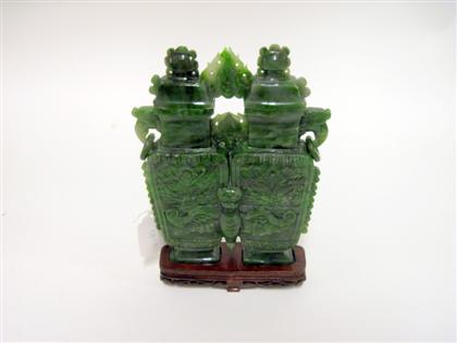 Appraisal: Tall Chinese carved green stone double chamber covered vaseGreen hue