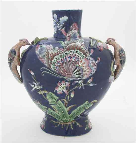 Appraisal: A Majolica Vase of compressed baluster form having bird form