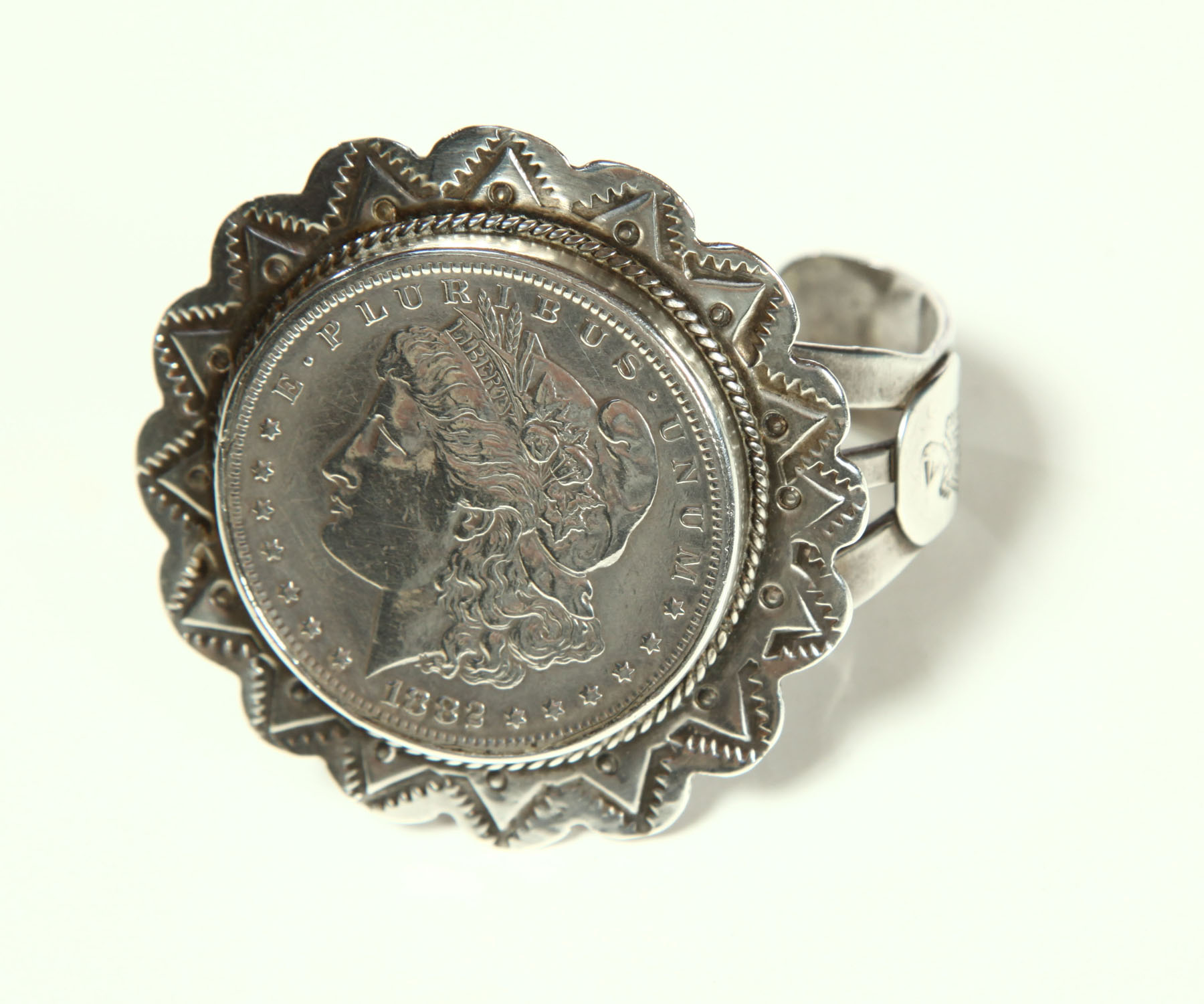 Appraisal: NAVAJO BRACELET Mid th century Tooled silver bracelet with a