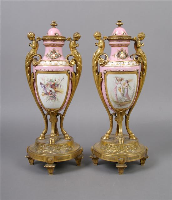 Appraisal: A Pair of French Porcelain and Ormolu Mounted Urns Height