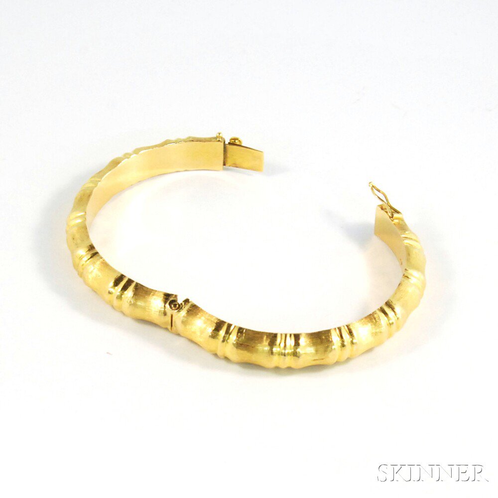 Appraisal: kt Gold Ribbed Bamboo-form Bangle Bracelet with brushed gold exterior