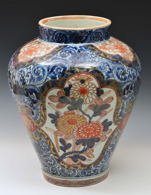 Appraisal: A JAPANESE ARITA INVERTED BALUSTER VASE with underglaze blue scrolls