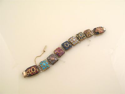 Appraisal: An Indian bracelet formed with assorted panels of cabochon rubies