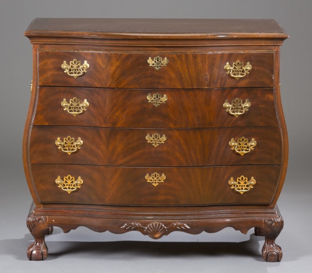 Appraisal: Bombay Heritage Mahogany Four-Drawer Chest Hardwoods and veneers H x