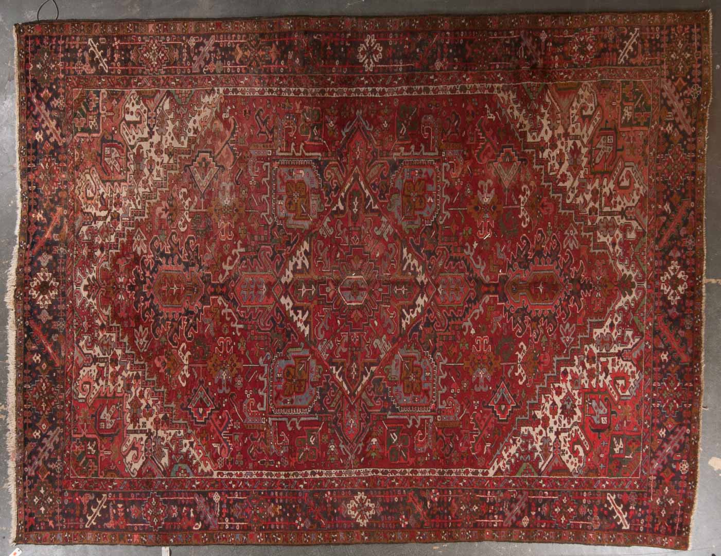 Appraisal: Persian Herez carpet approx x Iran circa Condition Worn with