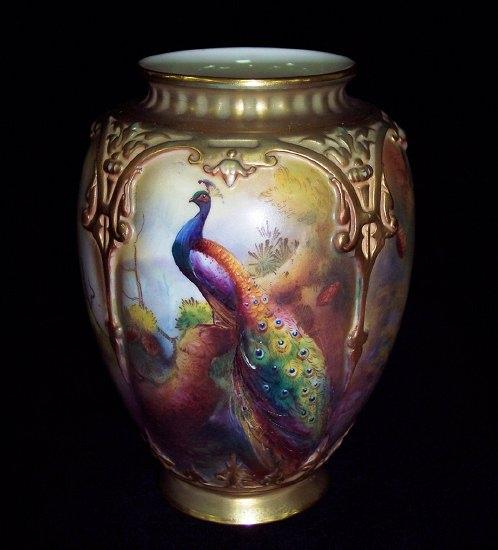 Appraisal: A Royal Worcester vase shape painted a peacock among trees