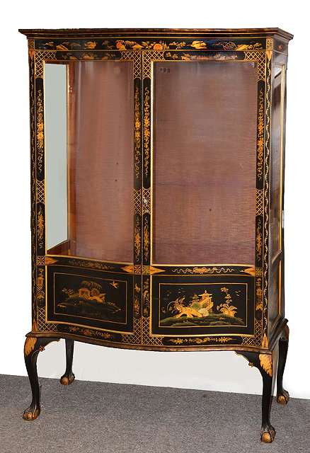 Appraisal: s chinoiserie display cabinetserpentine front enclosing two glass shelves cm