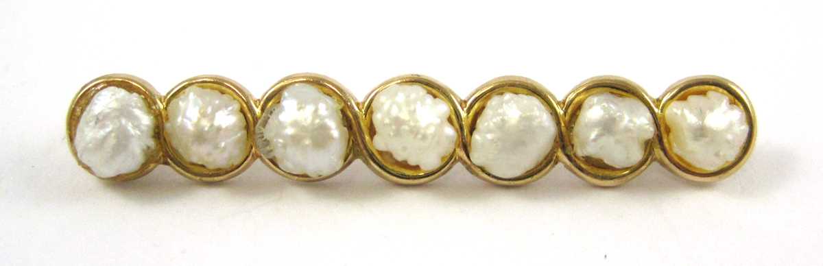 Appraisal: PEARL AND FOURTEEN KARAT GOLD BAR PIN set with seven