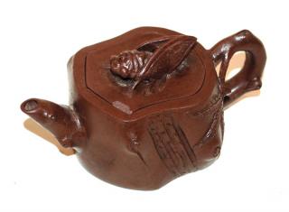 Appraisal: A Chinese Yi Xing Teapot With Cicada Finial in h