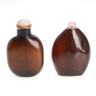 Appraisal: Chinese amber snuff bottles Chinese amber snuff bottles th th