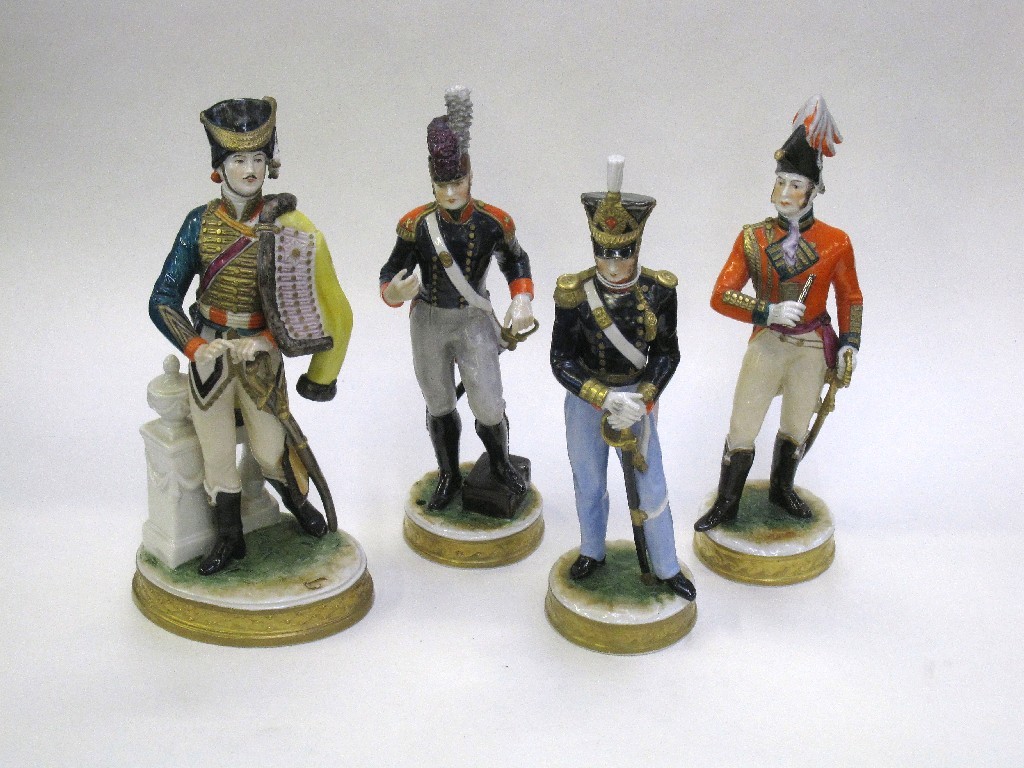 Appraisal: Four Sitzendorf porcelain figures of soldiers to include 'Gunner '