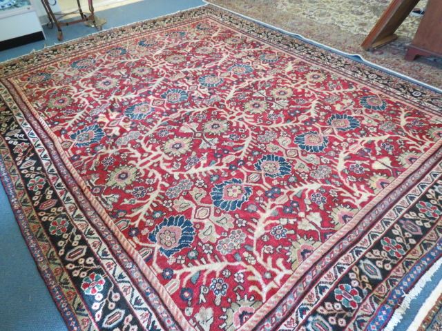 Appraisal: Mahal Persian Handmade Room Size Rug overall stylized florals deep