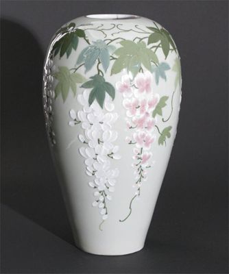 Appraisal: A Lichte Gebruder Heubach porcelain vase decorated in slip with