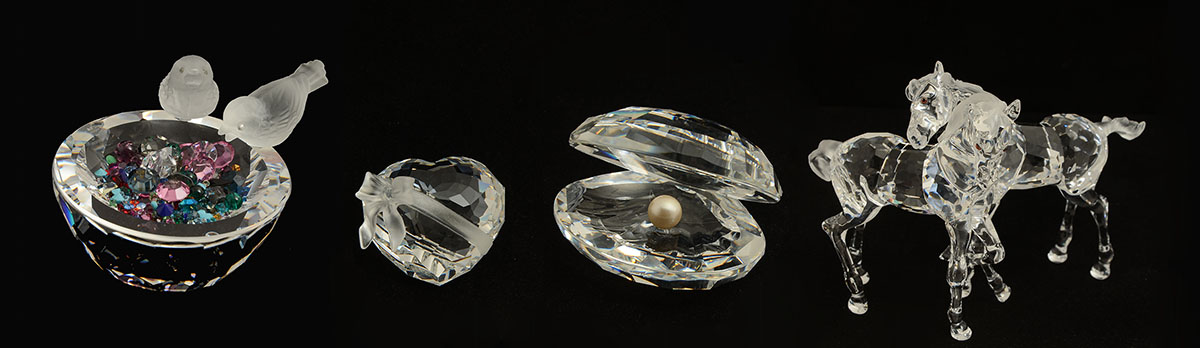 Appraisal: COLLECTION OF SWAROVSKI CRYSTAL FIGURES To include Clam shell with